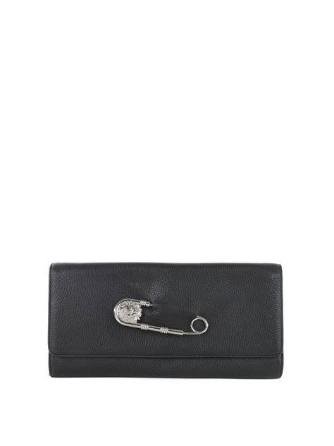 versus versace safety pin clutch bag